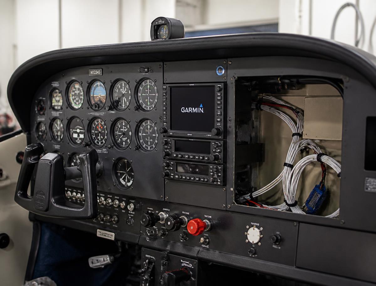 Cessna instrument panel during an avionics modernization with Garmin stack partially installed